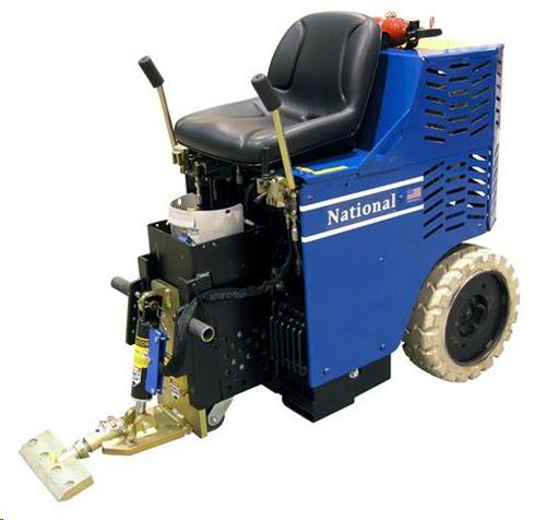 Blue and black ride-on floor scraper with a seat, controls, and scraping blade.