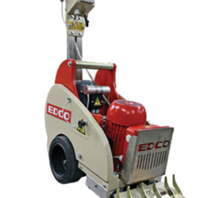 An EDCO industrial floor grinder with a red motor, cream casing, and metal grinding head on wheels.
