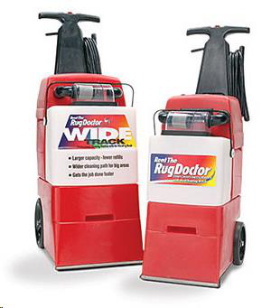 Two red Rug Doctor carpet cleaning machines, a Wide Track model on the left and a standard model on the right.