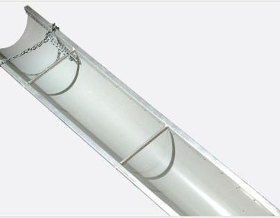 A long, metal half-pipe gutter or trough featuring evenly spaced curved metal supports along its length.