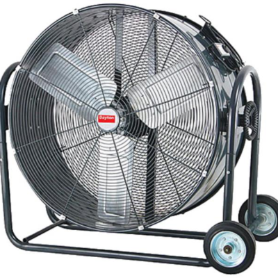 A heavy-duty, gray industrial drum fan on wheels, featuring a protective metal grill and three-blade propeller.
