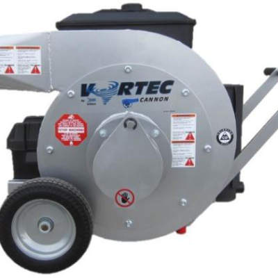 Silver Vortec Cannon industrial leaf blower on wheels with warning labels and a black motor.