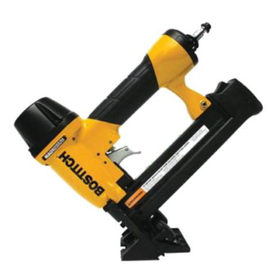 A yellow and black Bostitch pneumatic flooring nailer angled against a plain white background.