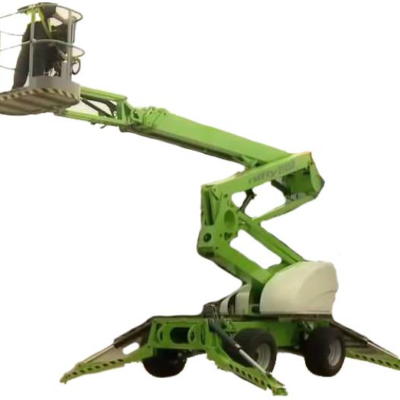 A bright green cherry picker aerial lift with an extended boom and an occupied work platform, isolated on white.