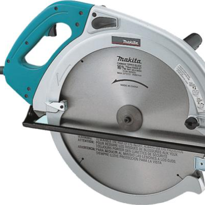 A teal and silver Makita 16 5/16-inch circular saw viewed from the side, isolated on a white background.