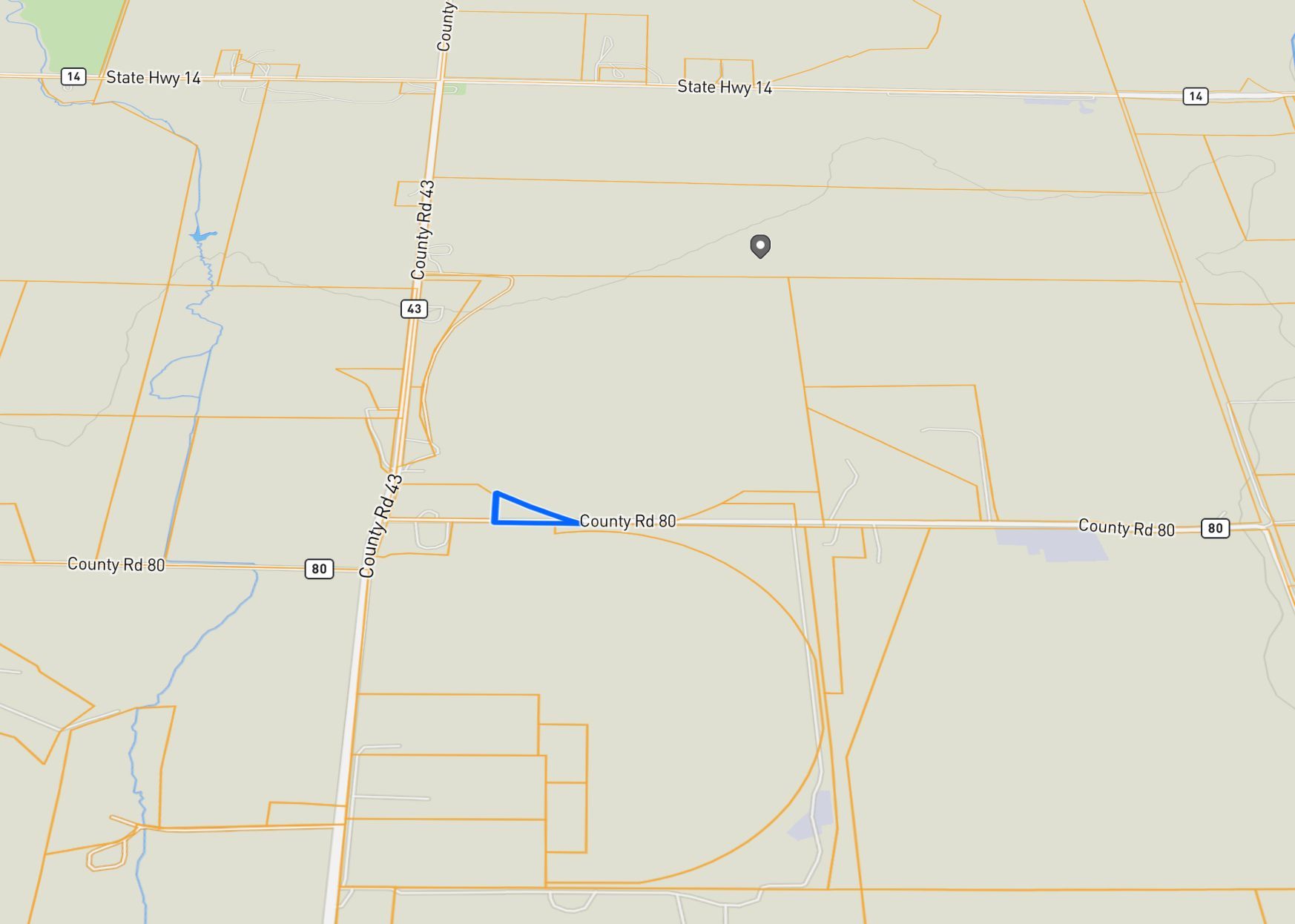 A map of a field with a blue triangle in the middle.