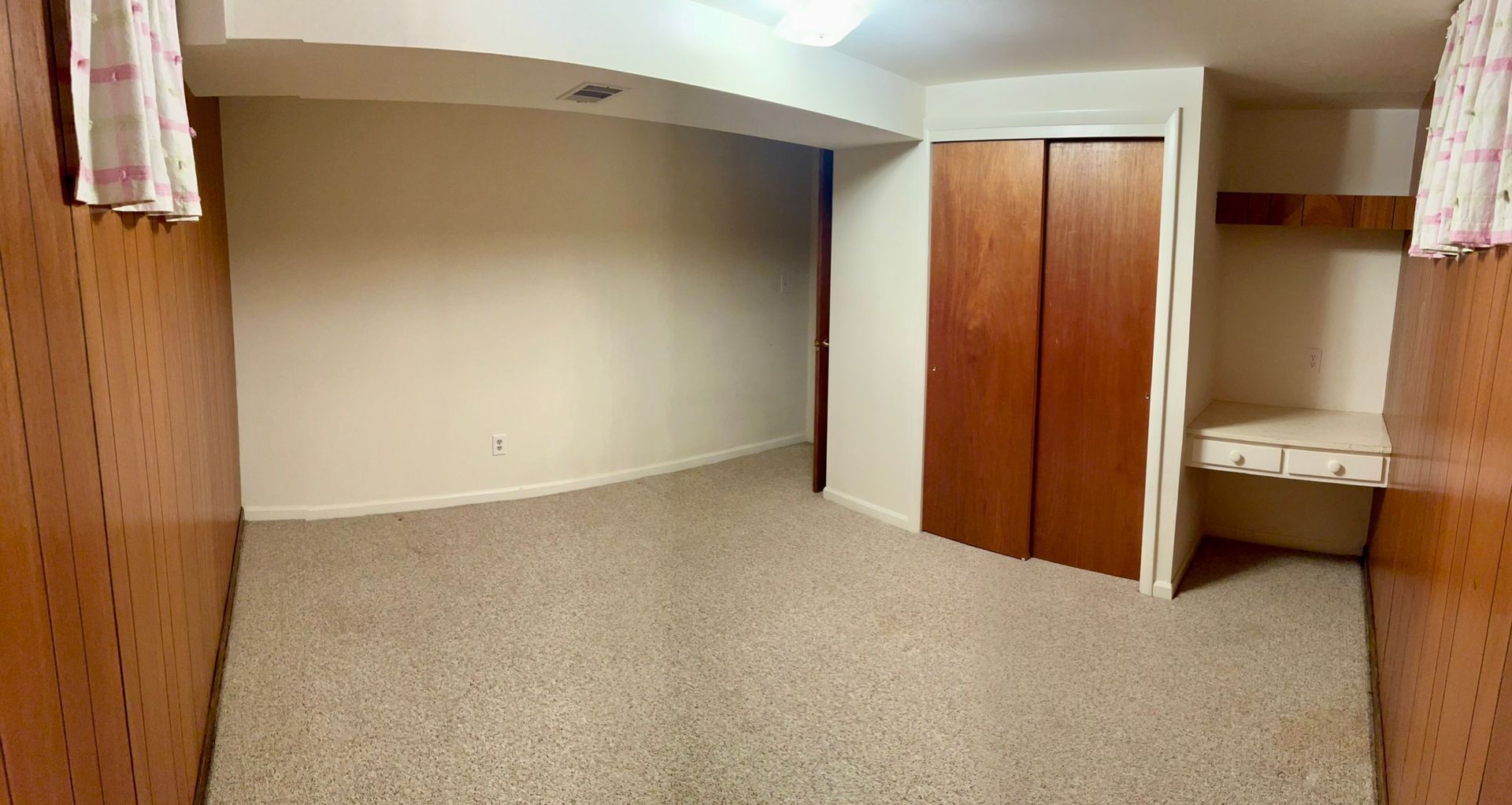 There is a closet in the corner of the room.