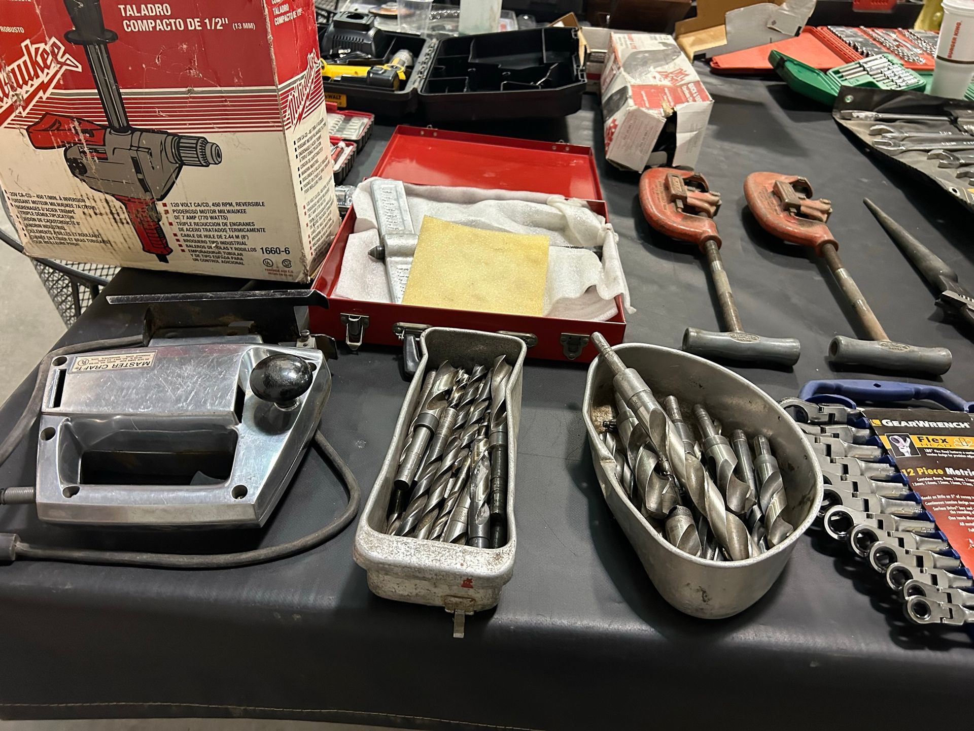 A table with a bunch of tools on it