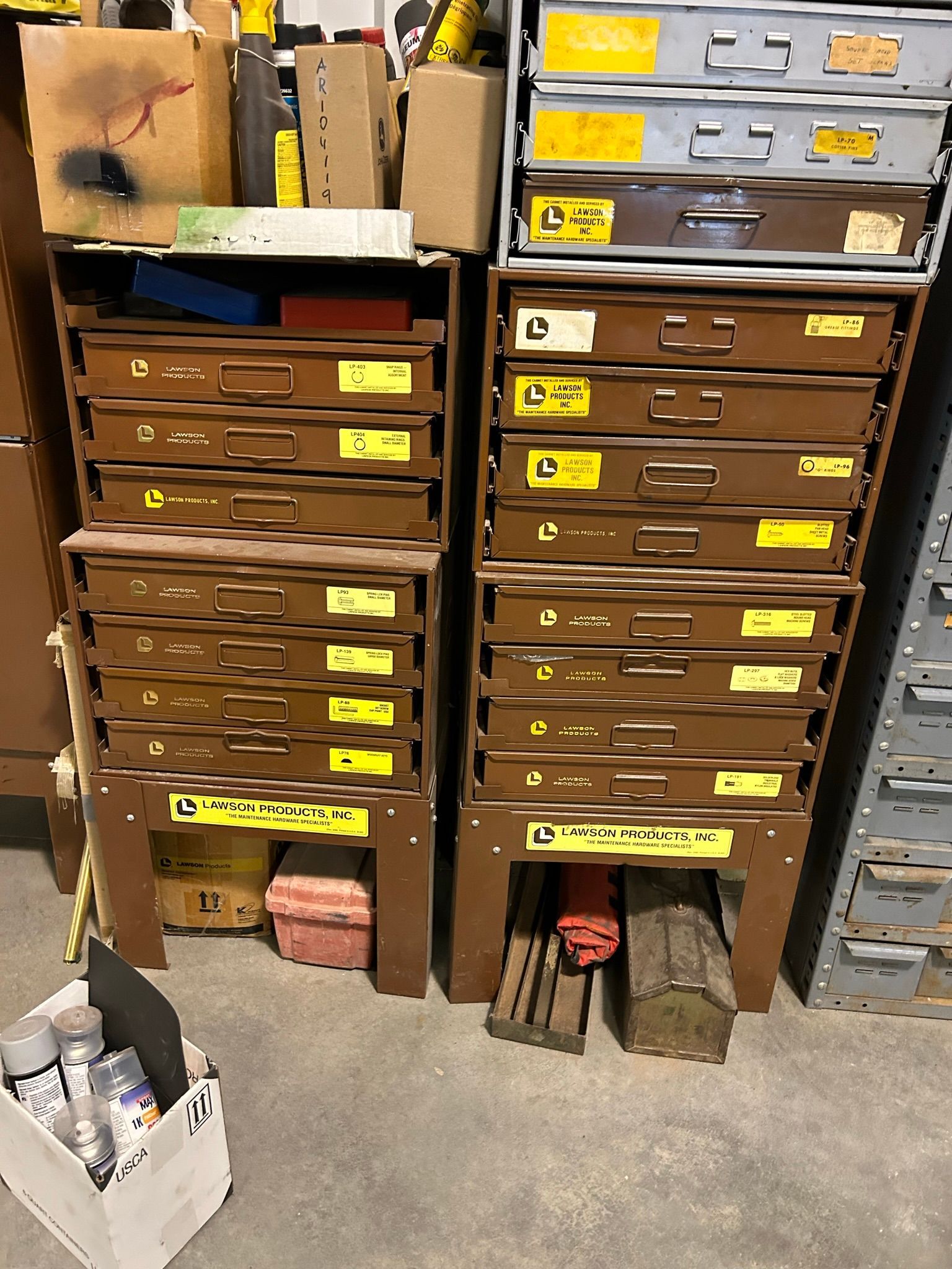 A bunch of drawers are stacked on top of each other in a room.