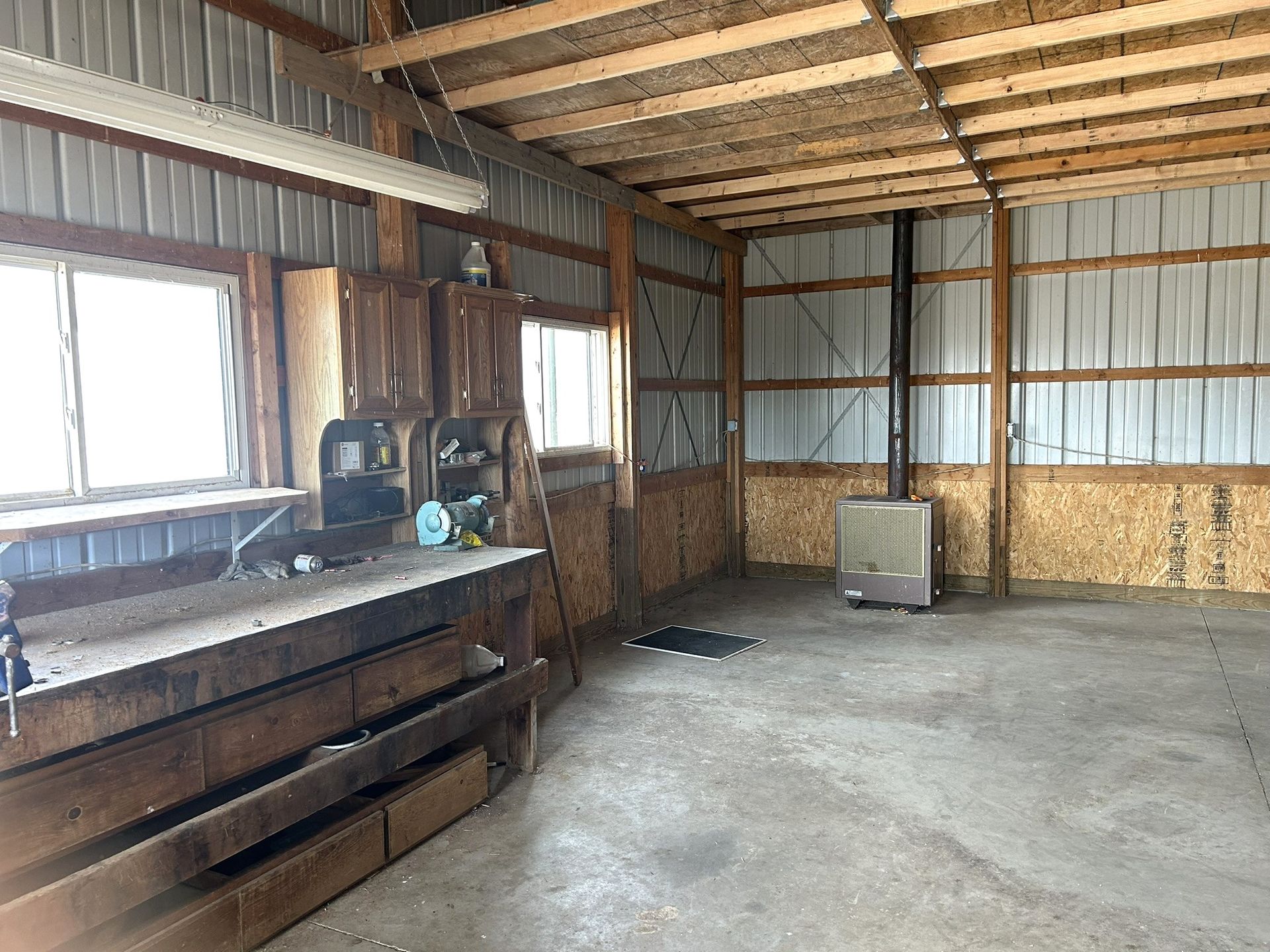 There is a stove in the middle of the room.