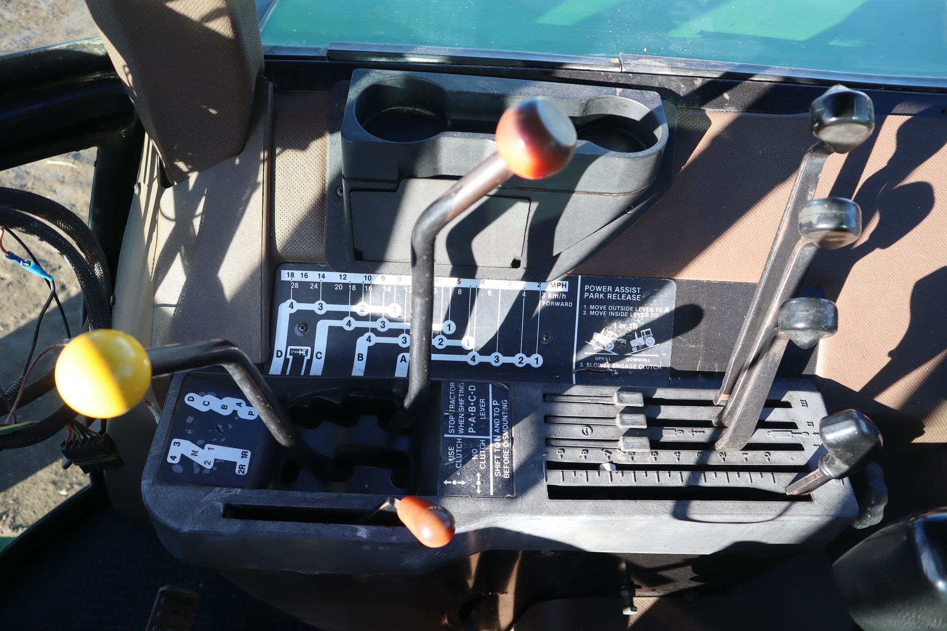 A close up of the controls on a tractor