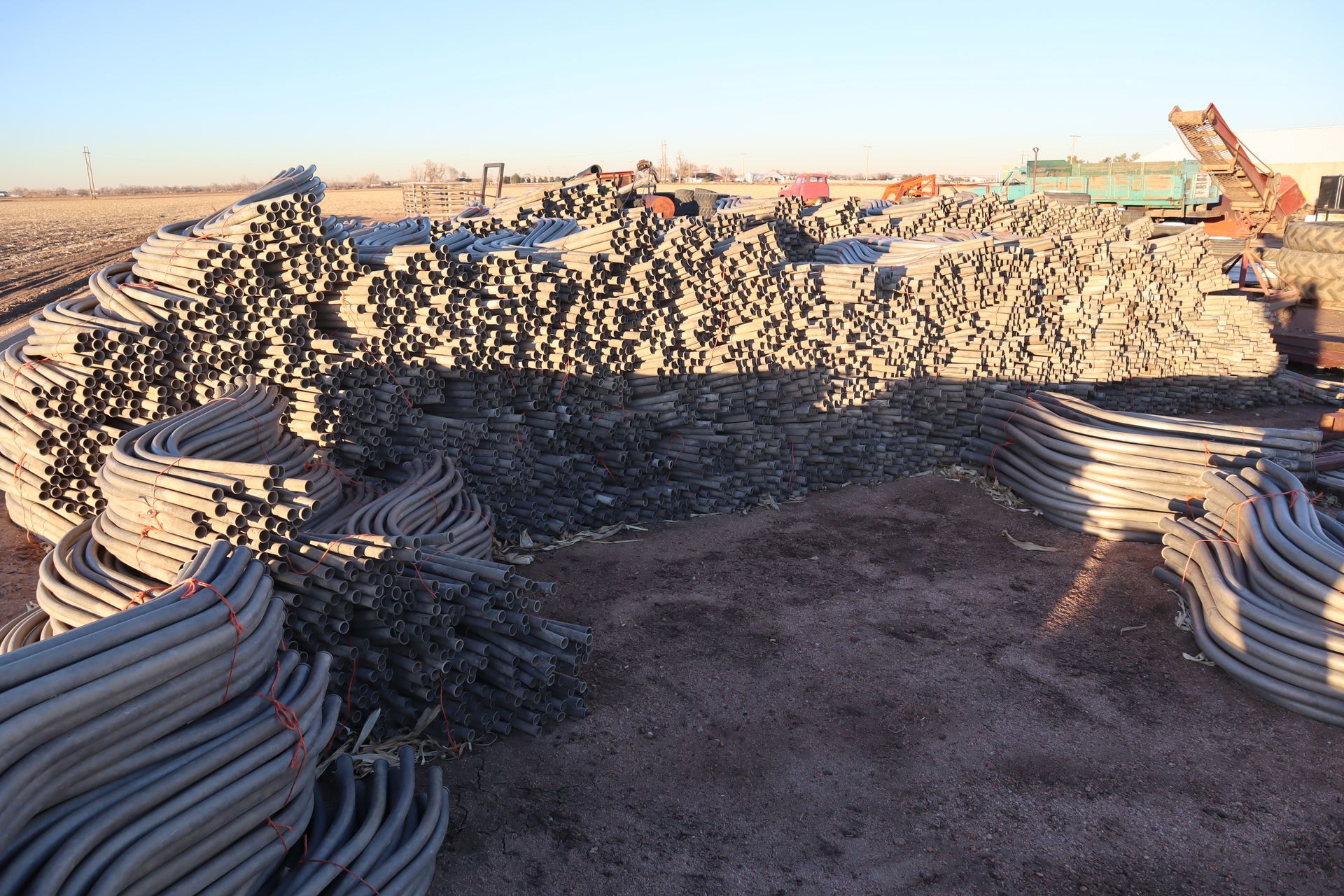 A large pile of tires are stacked on top of each other