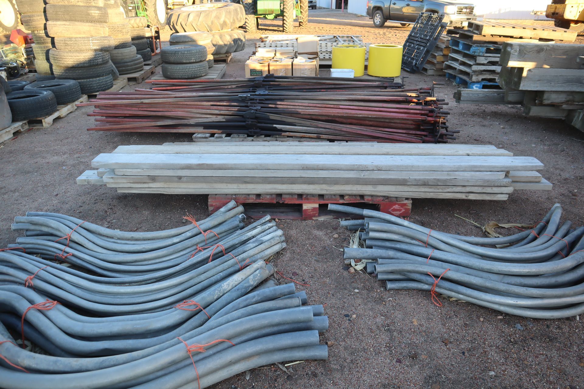 A bunch of metal pipes are stacked on top of each other