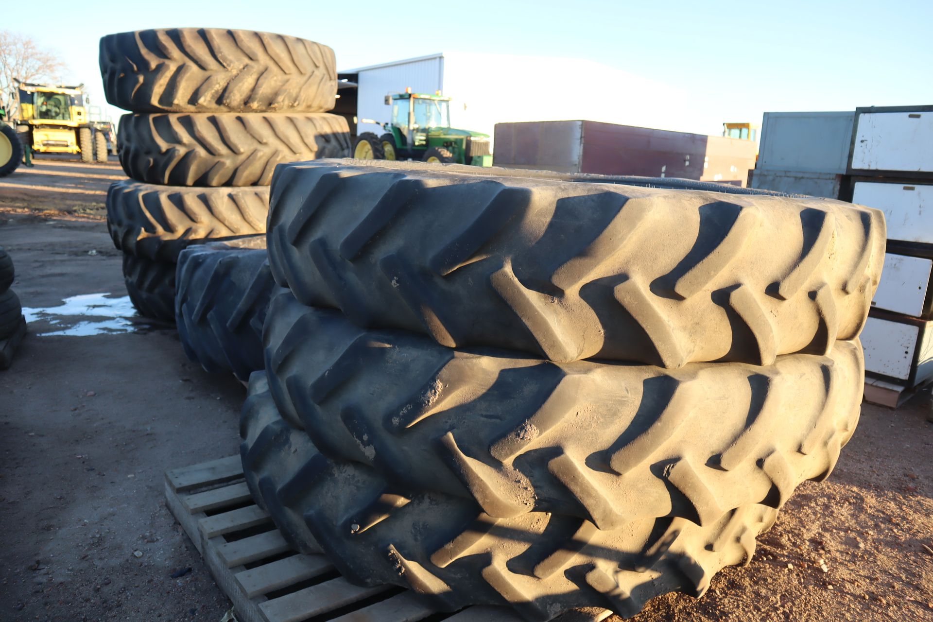 A bunch of tires are stacked on top of each other