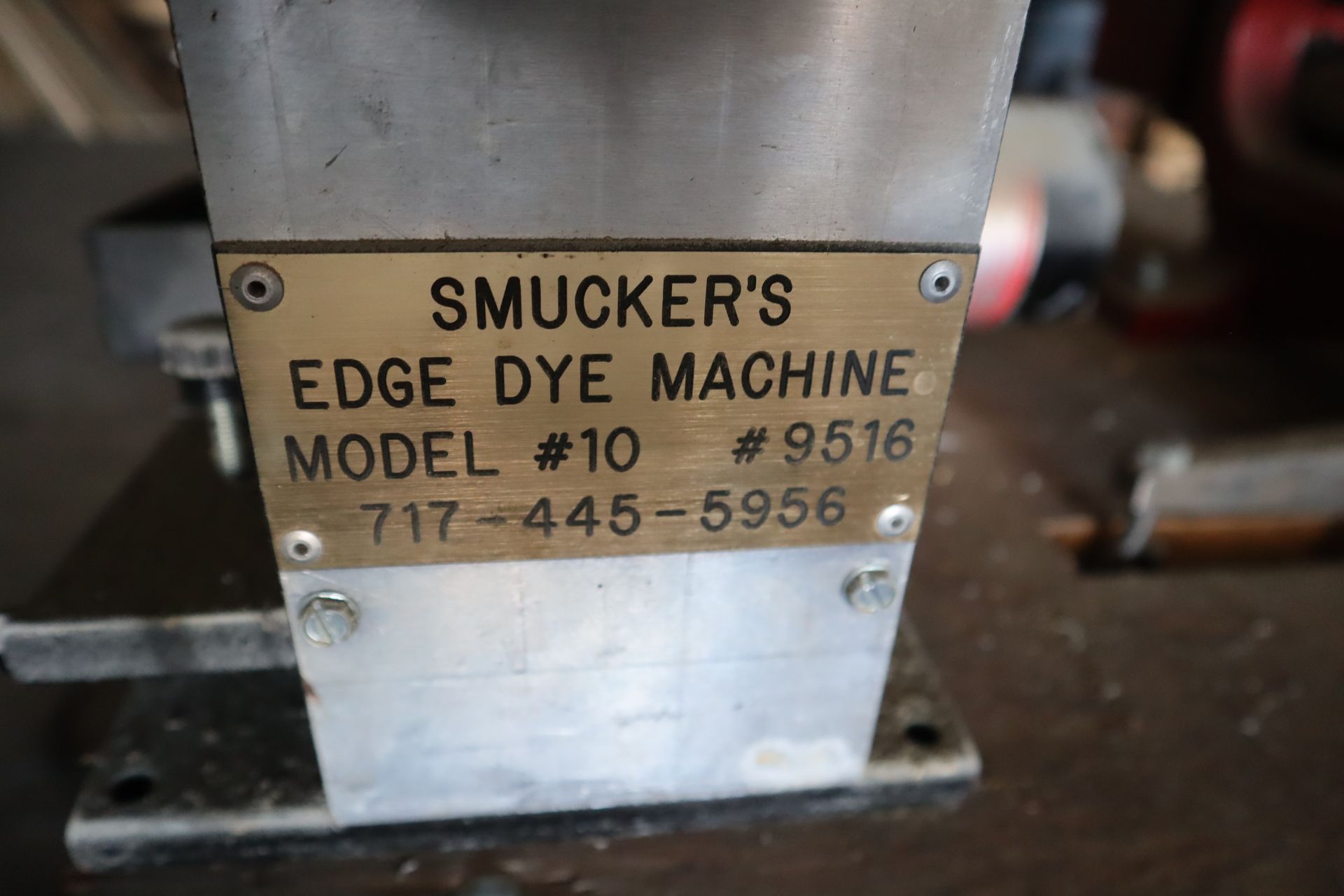 Close-up of a metal machine plate: 