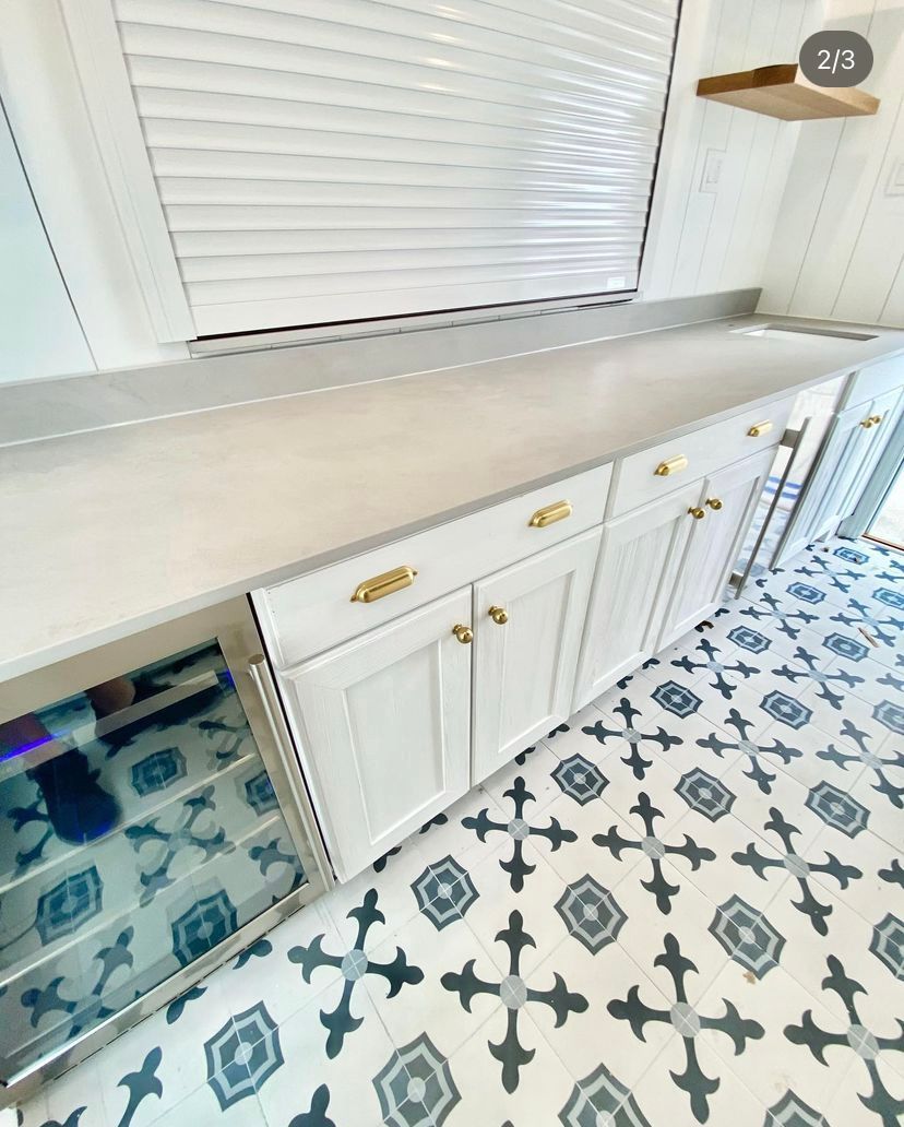 white kitchen cabinets with gold handles