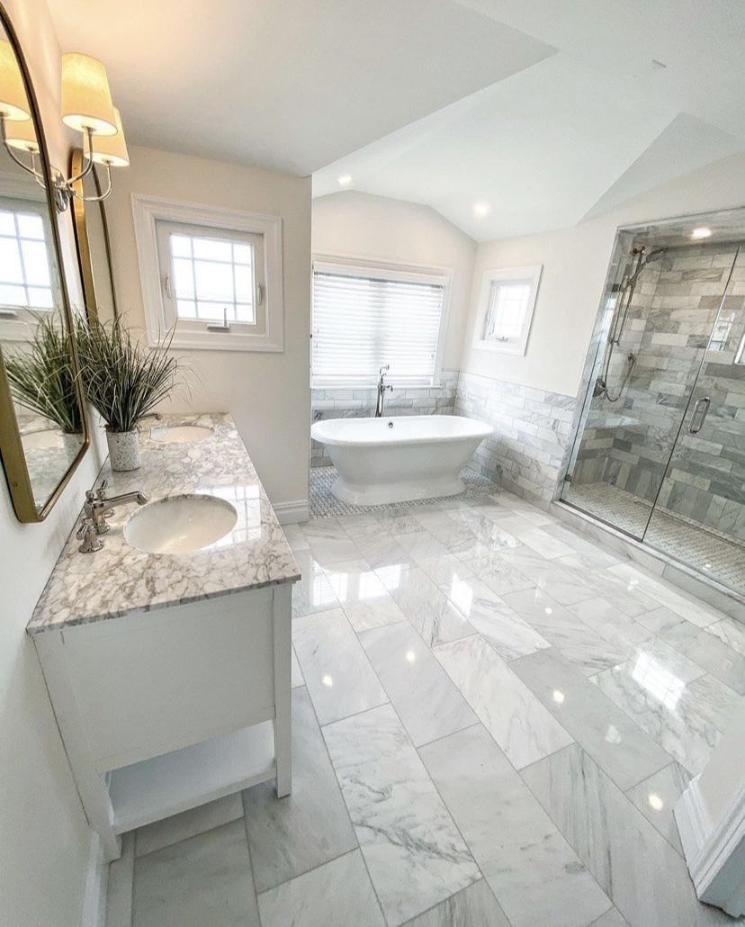 gold mirrors in bathroom