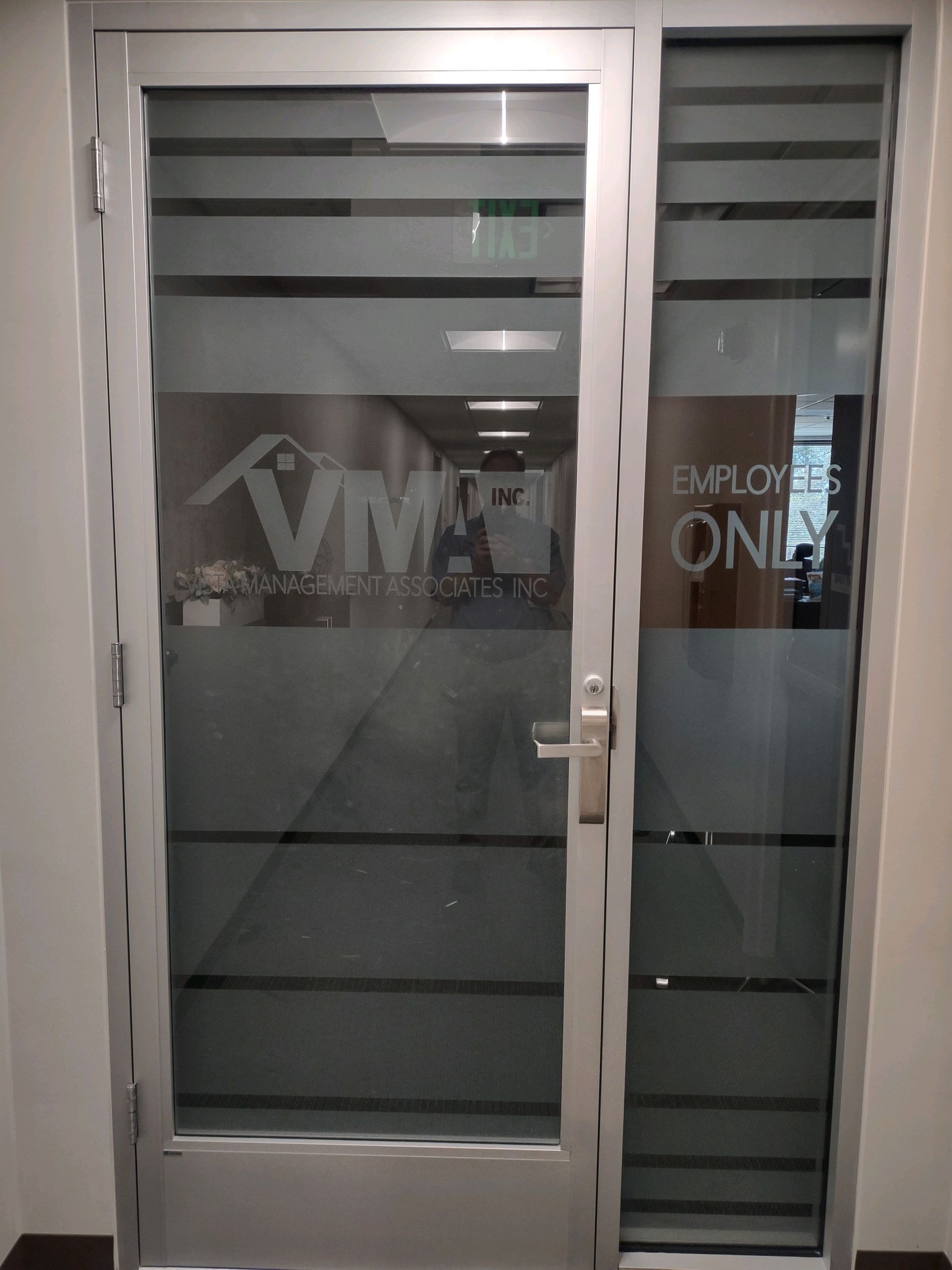 A door with a sign on it that says