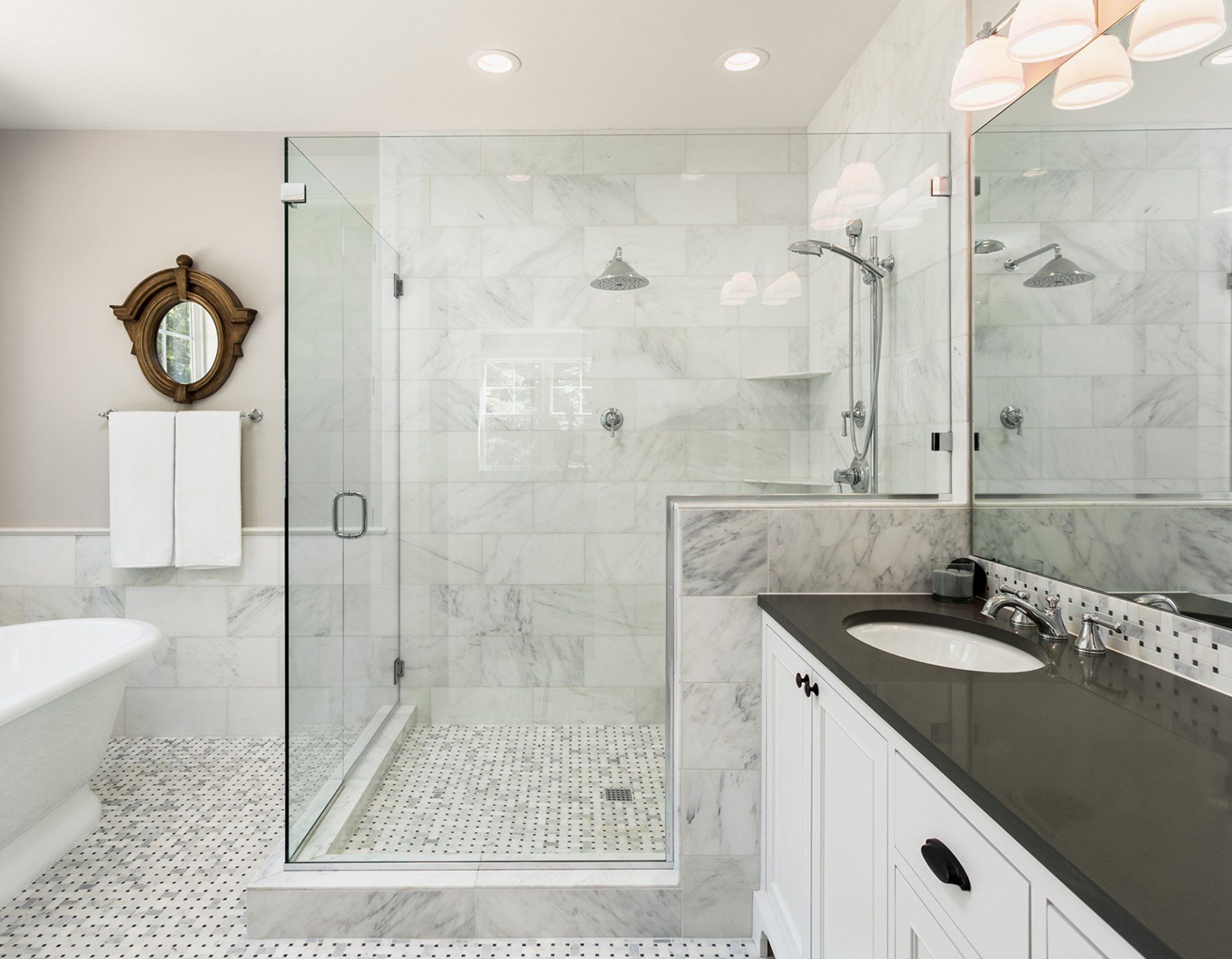 Bathroom mirror and shower glass enclosure