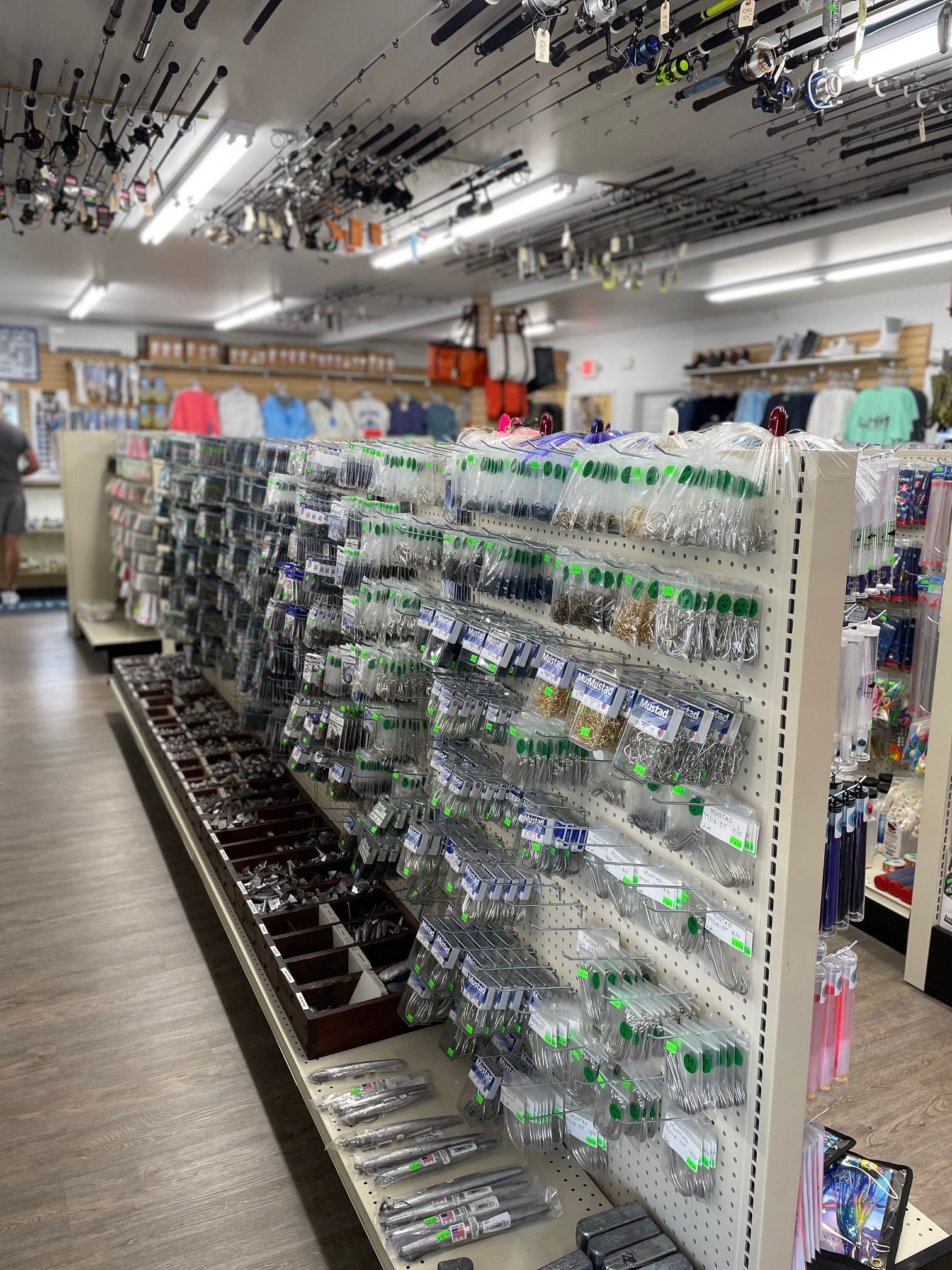 A store filled with lots of shelves filled with fishing supplies.