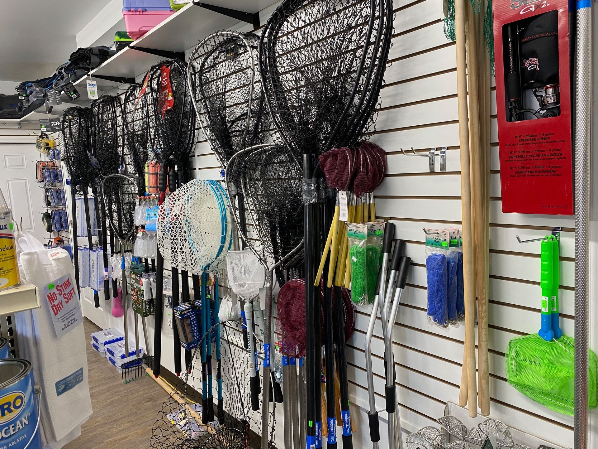 A store filled with lots of cleaning supplies and fishing nets.