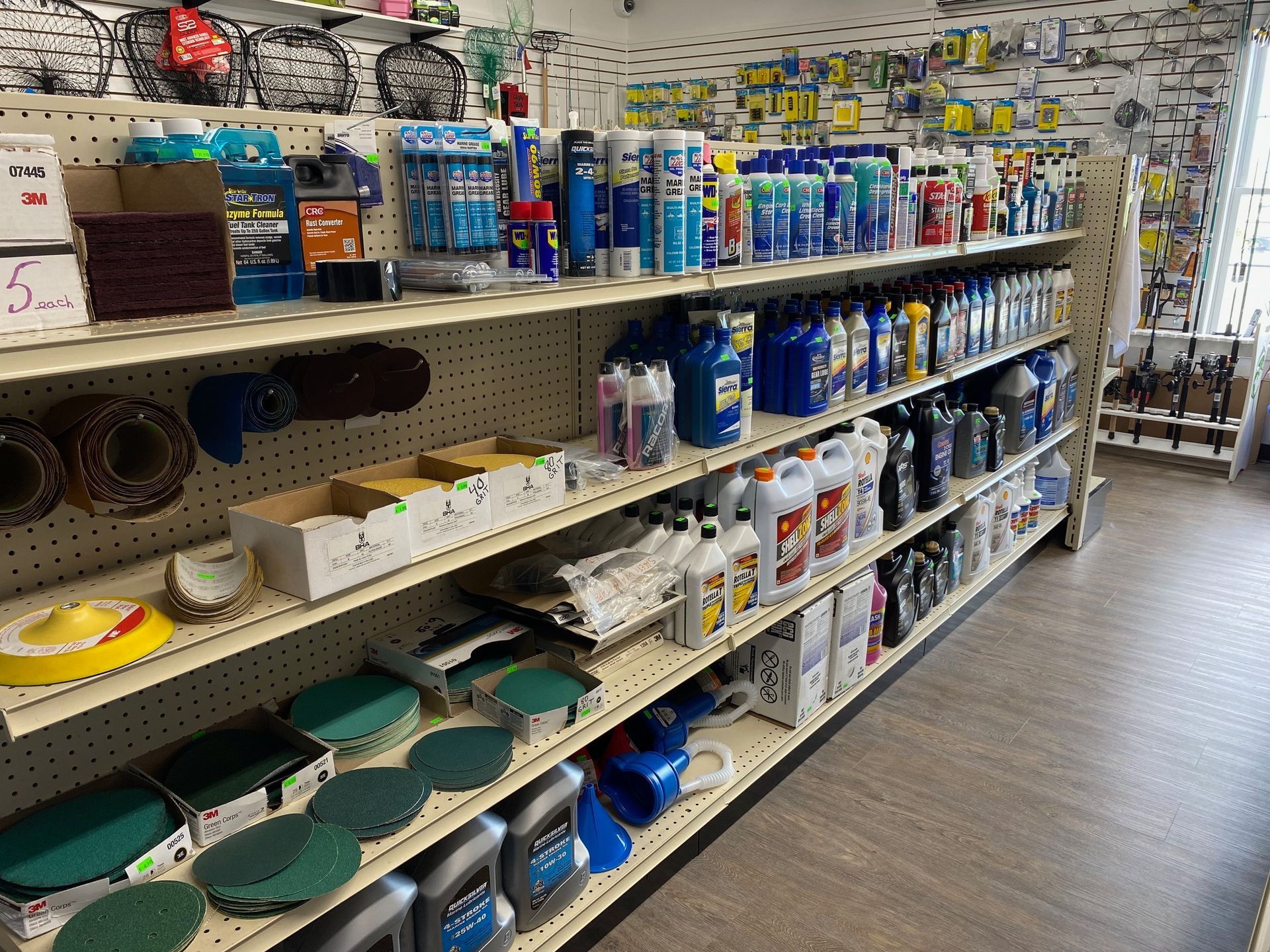A store filled with shelves filled with lots of cleaning supplies.