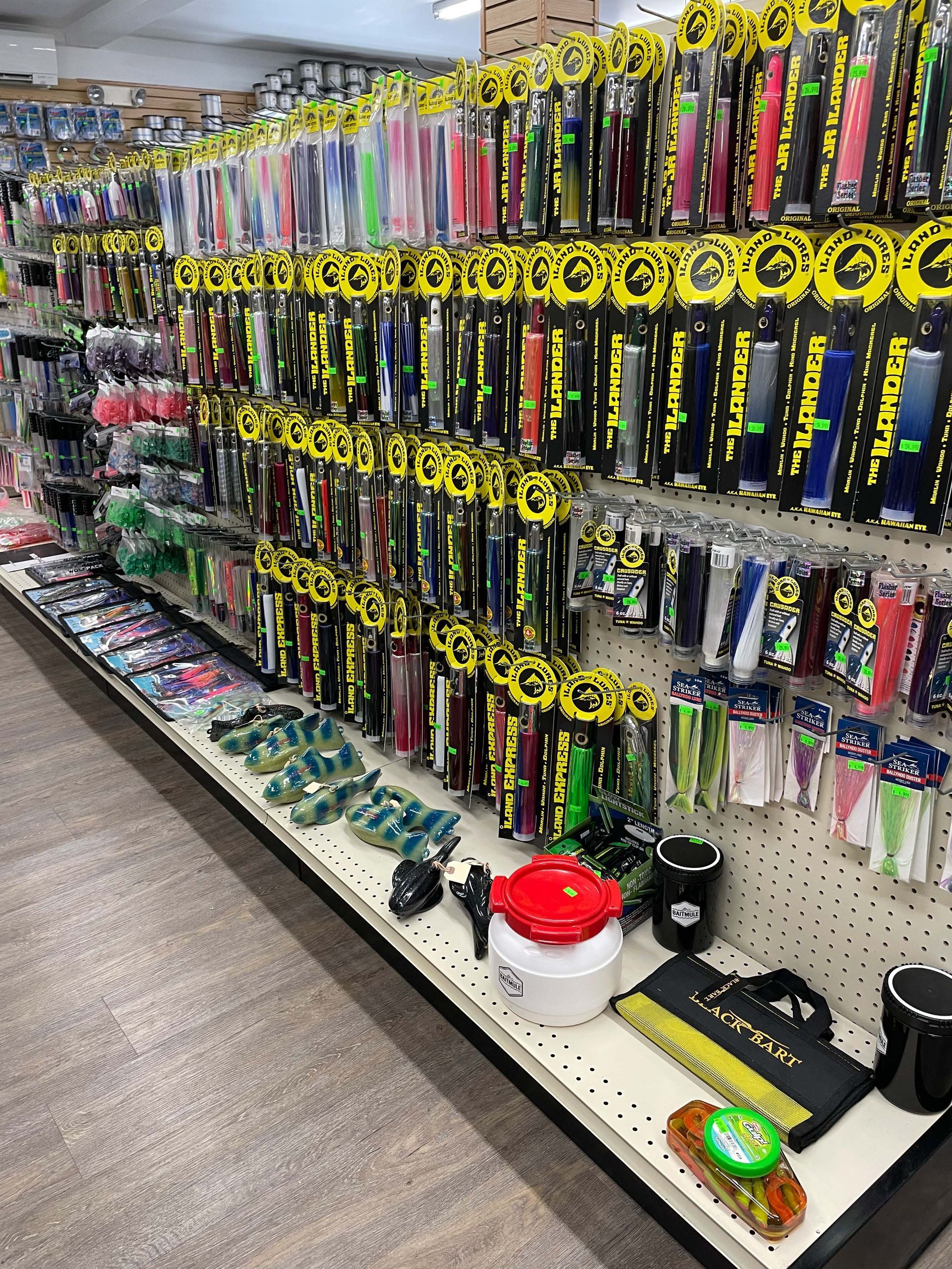 A fishing store filled with lots of fishing gear and fishing lures.