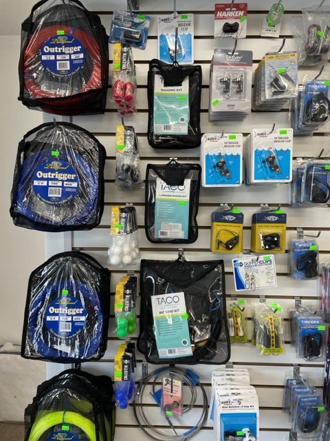 A wall full of various items including one that says tnco