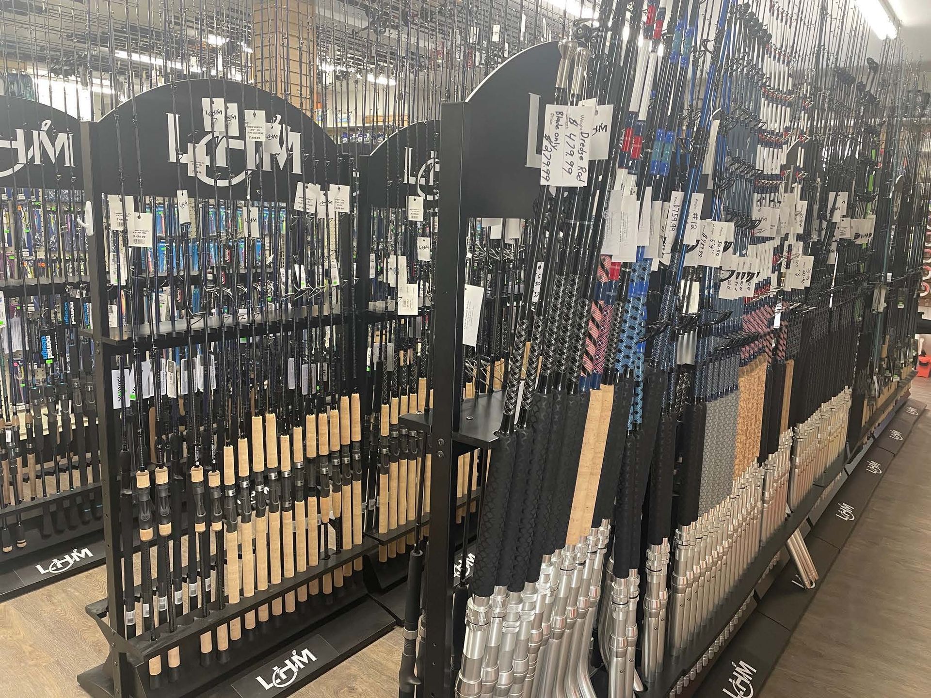 A row of shelves filled with lots of keys in a store.
