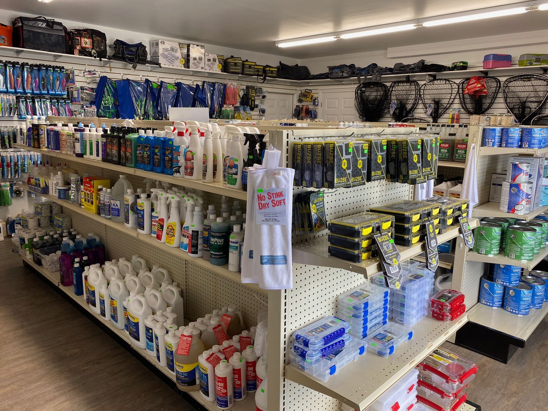 A store filled with shelves filled with lots of cleaning supplies.
