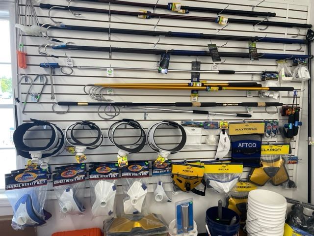 A wall with a bunch of tools hanging on it