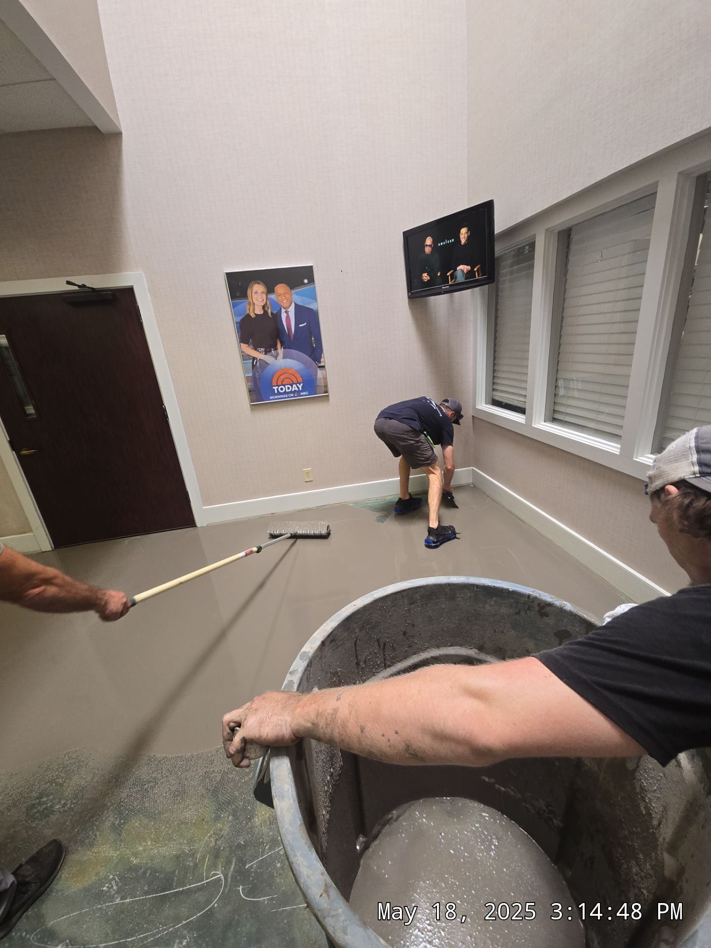 People leveling the floor