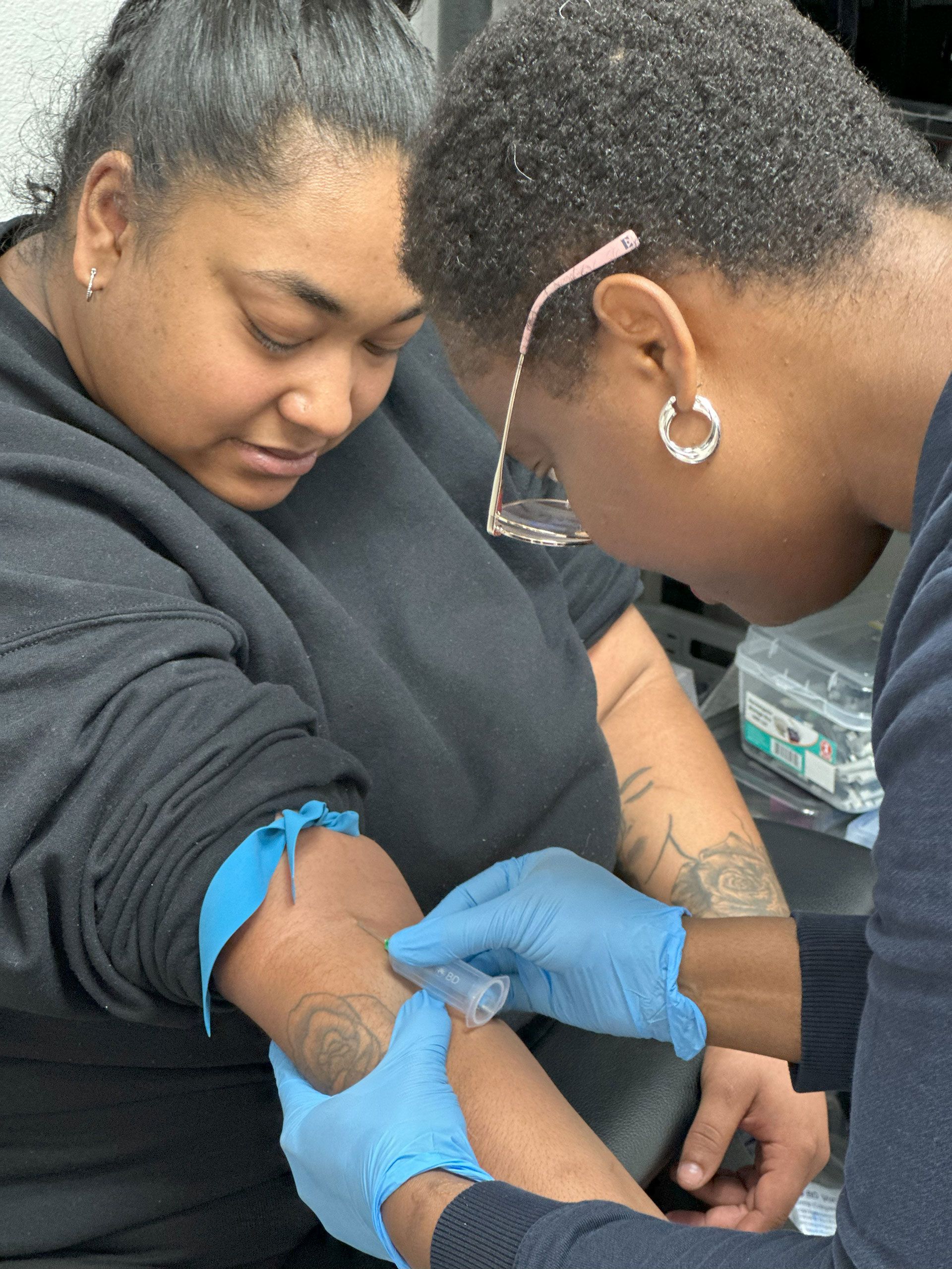 Injecting needle on the skin