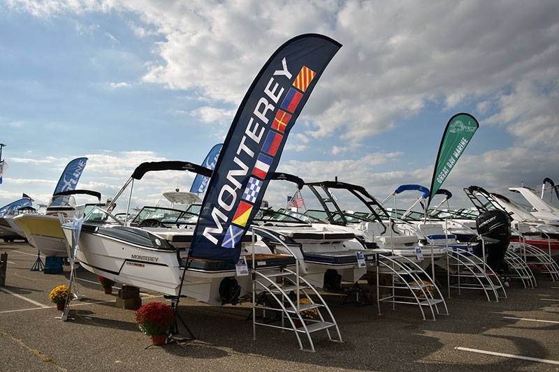 A row of boats with a banner that says monterey on it
