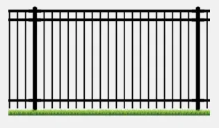Black metal fence with vertical bars, over green grass.