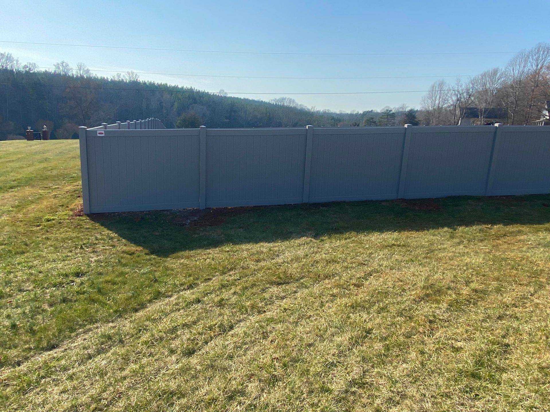 Vinyl fence in white installation