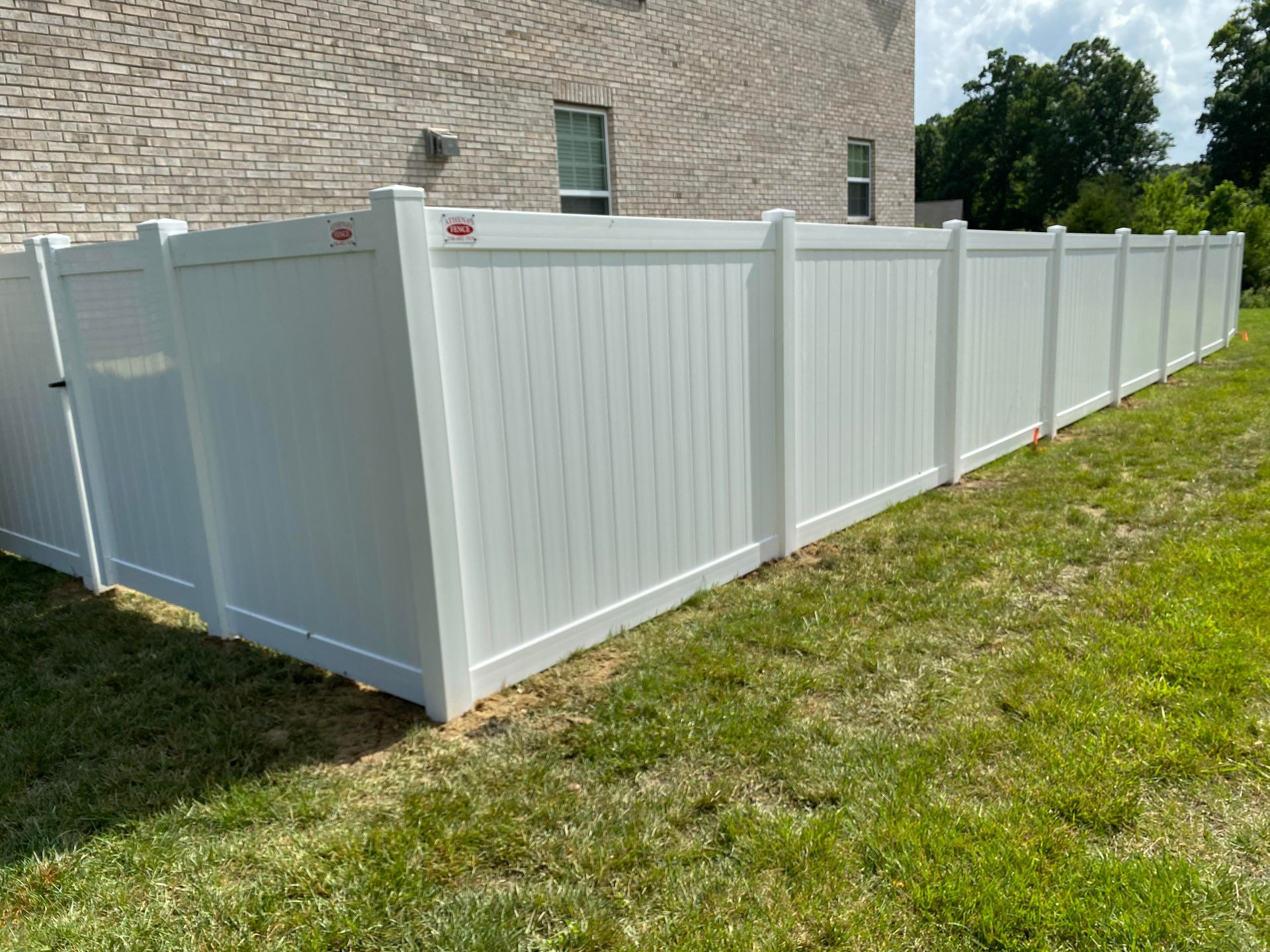 White vinyl privacy fence install