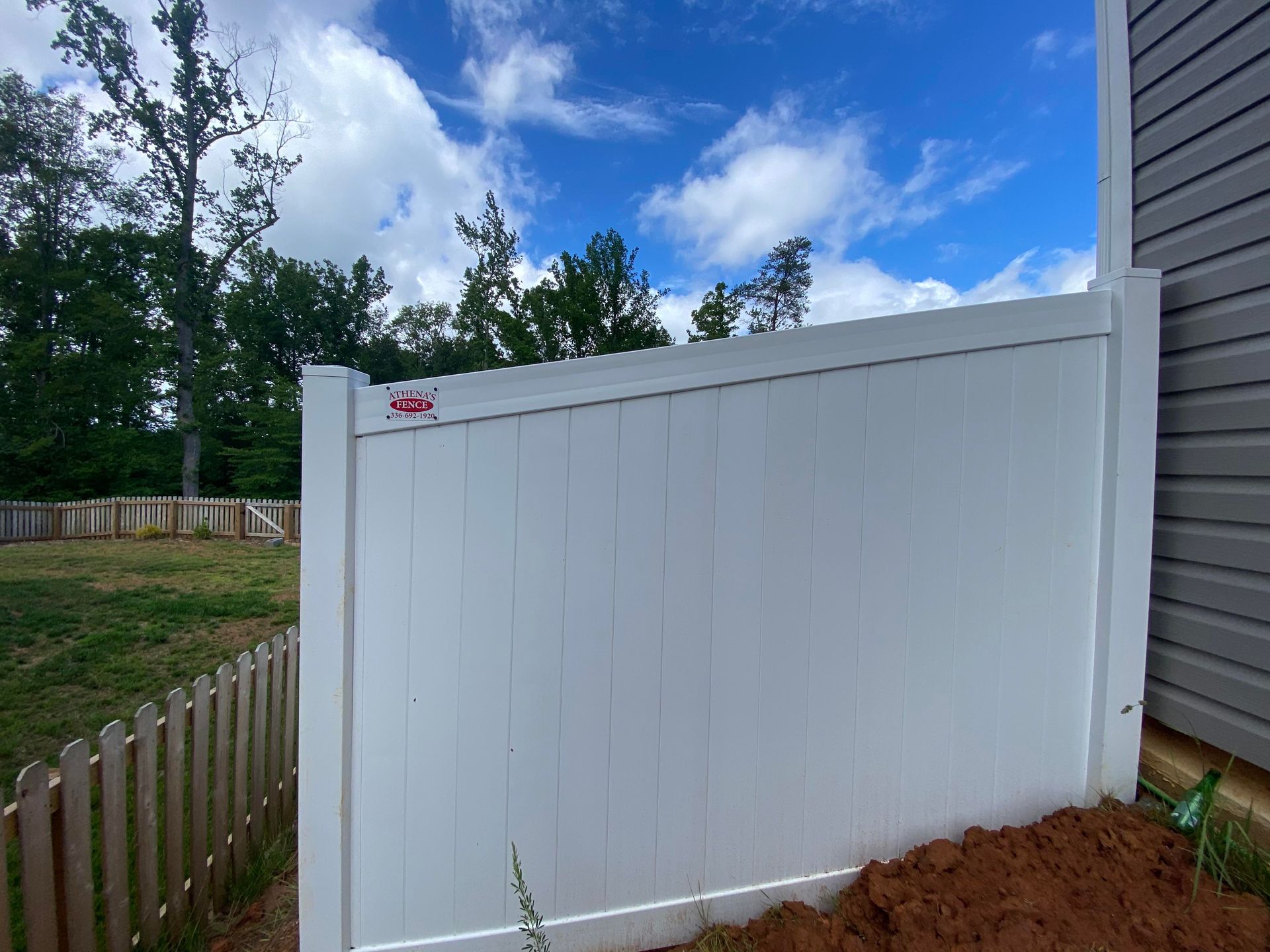 White vinyl fence panels