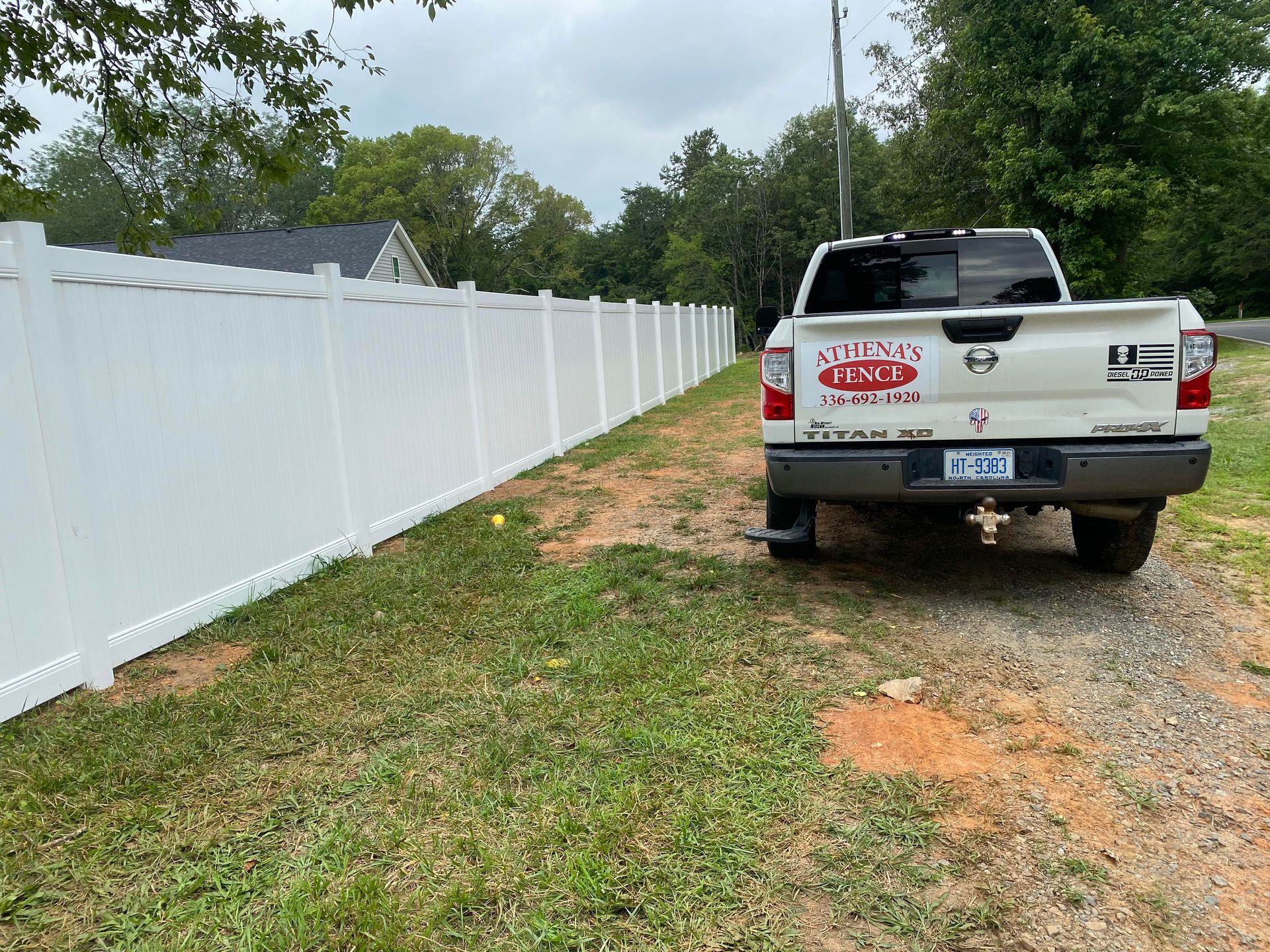 White vinyl fence panels installation