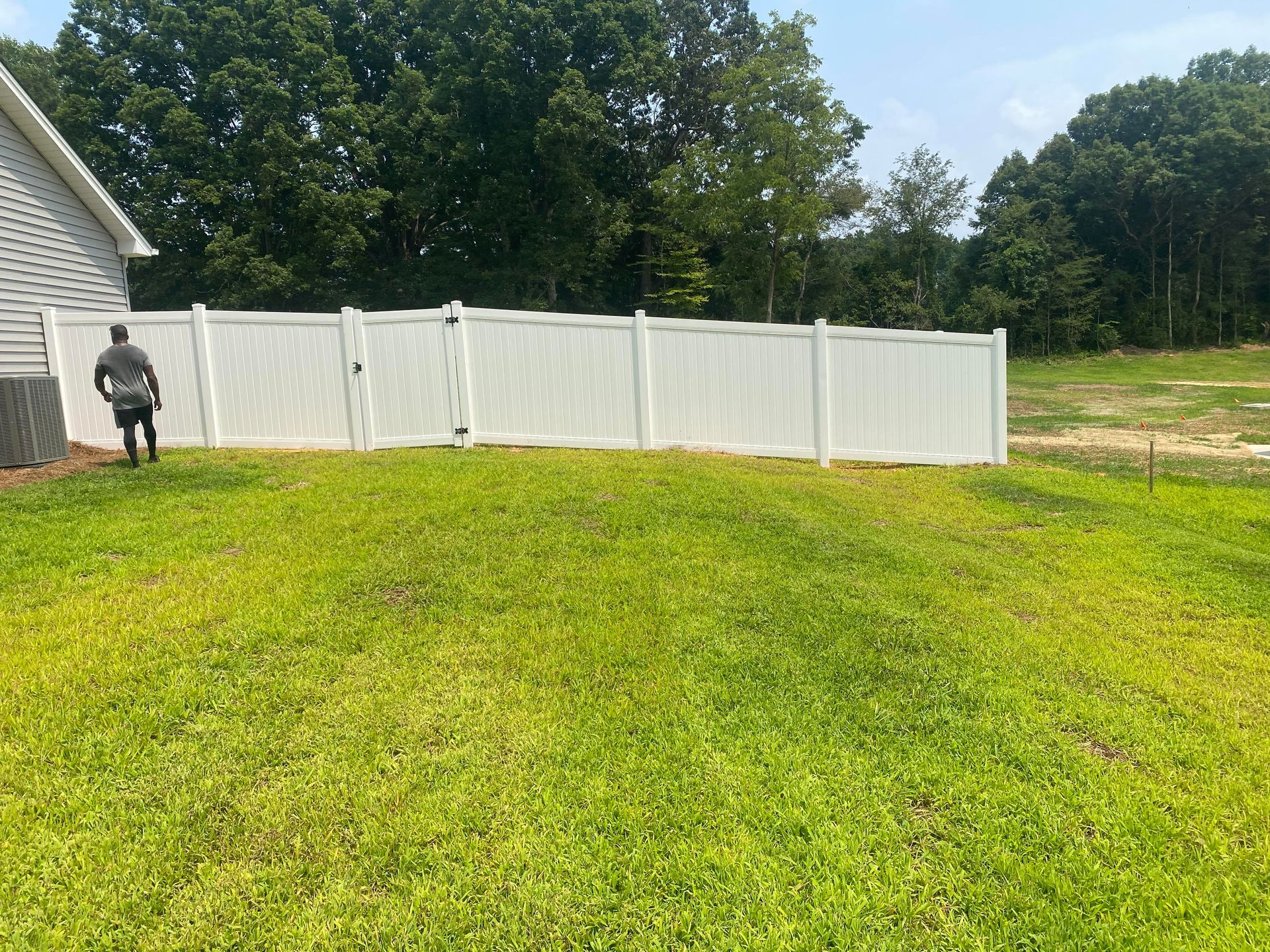Residential white vinyl fencing