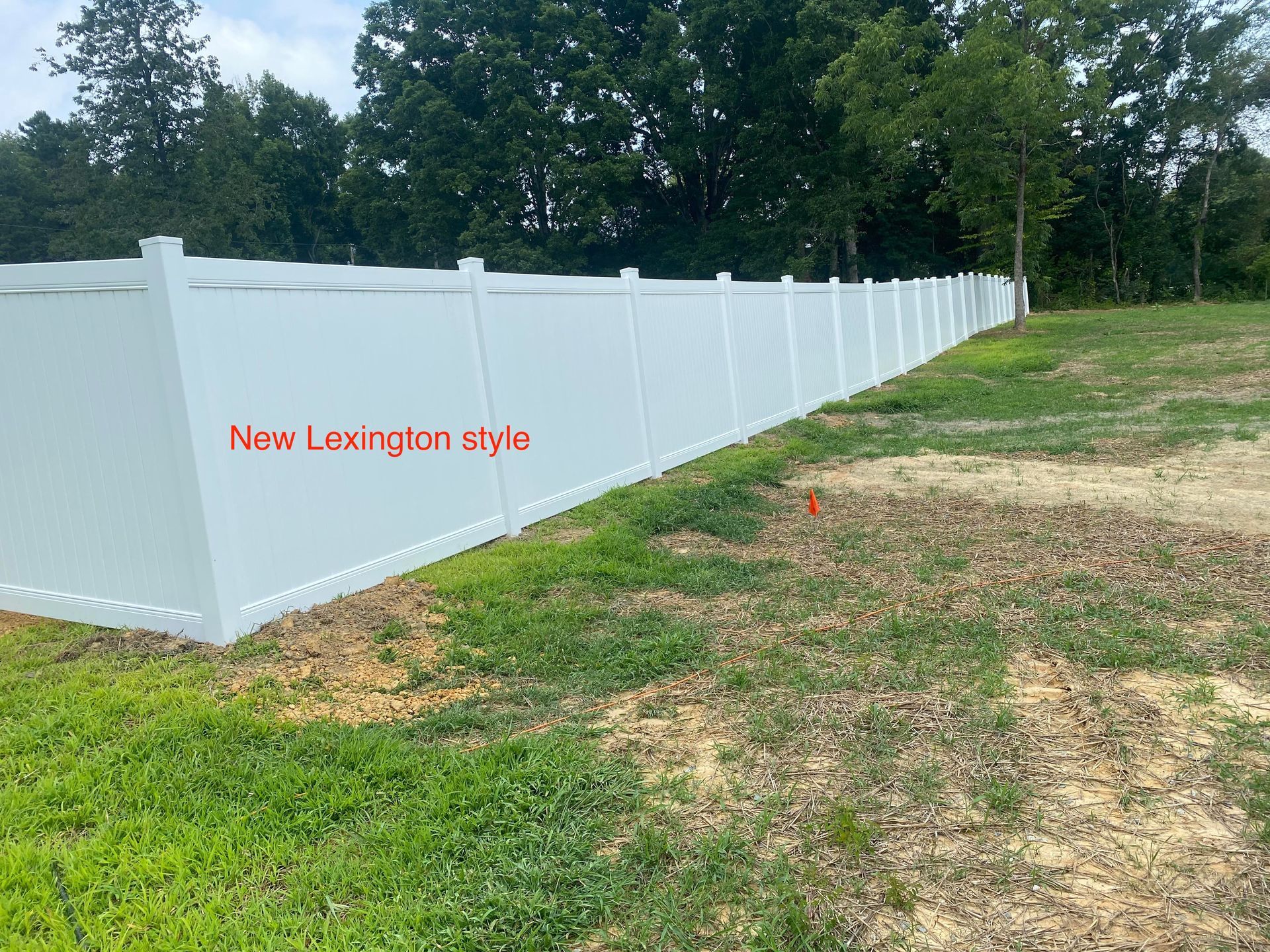 Outdoor white vinyl board-on-board