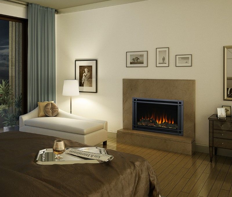 A bedroom with a fireplace and a bed