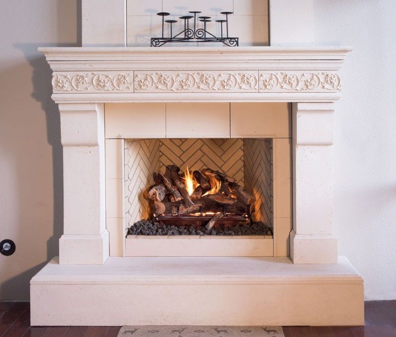 A fireplace with a candle holder on top of it