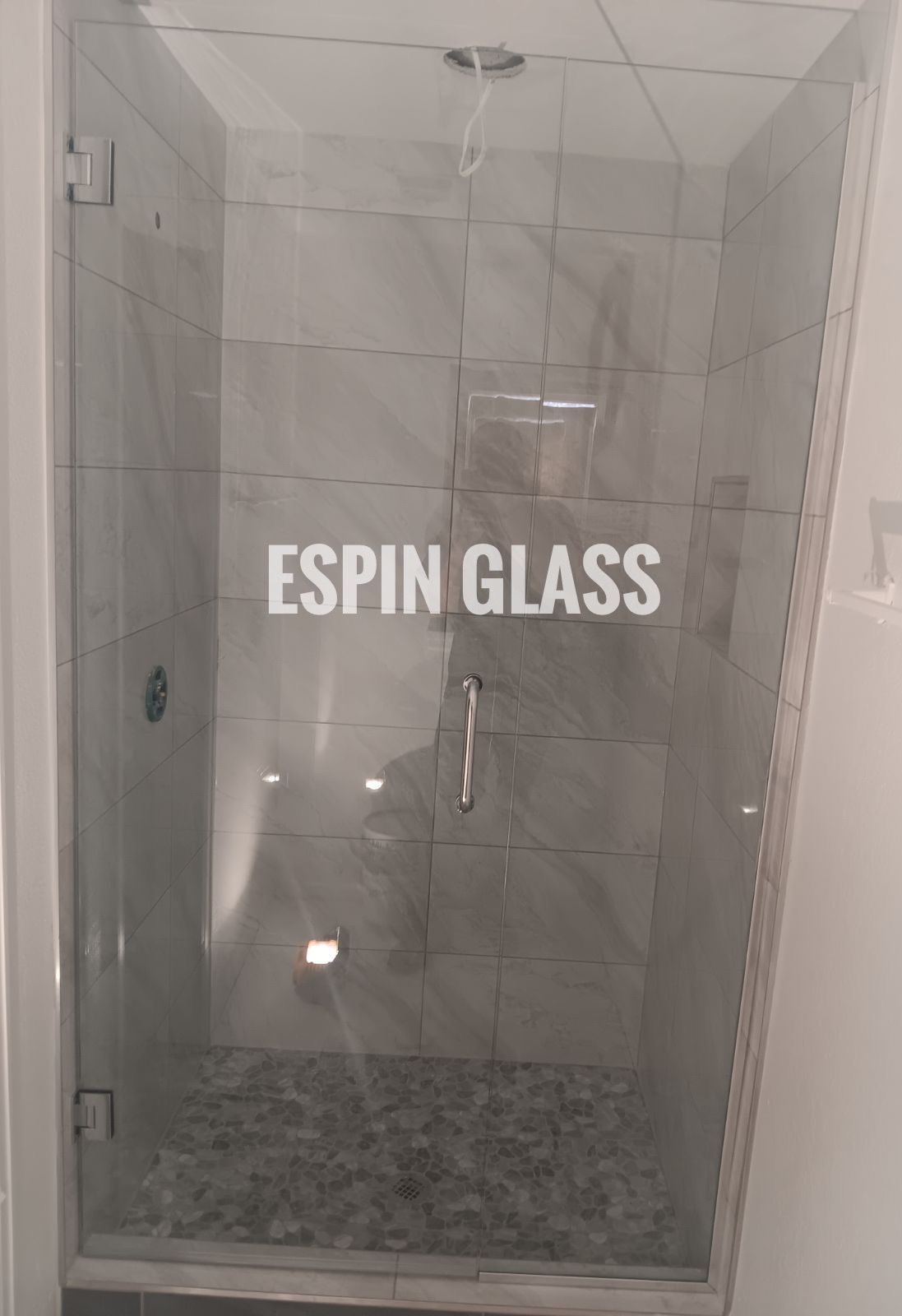 Glass shower enclosure with 