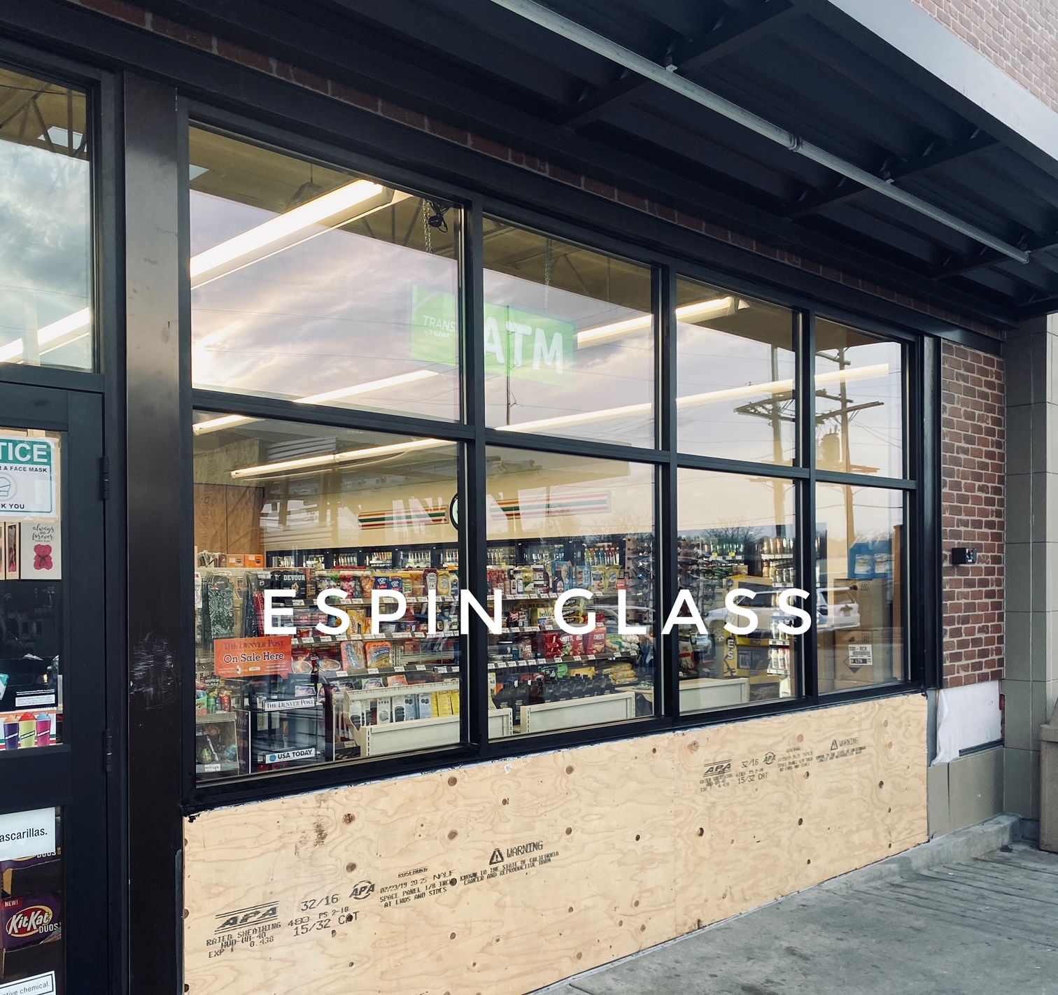 Storefront with plywood over windows; 