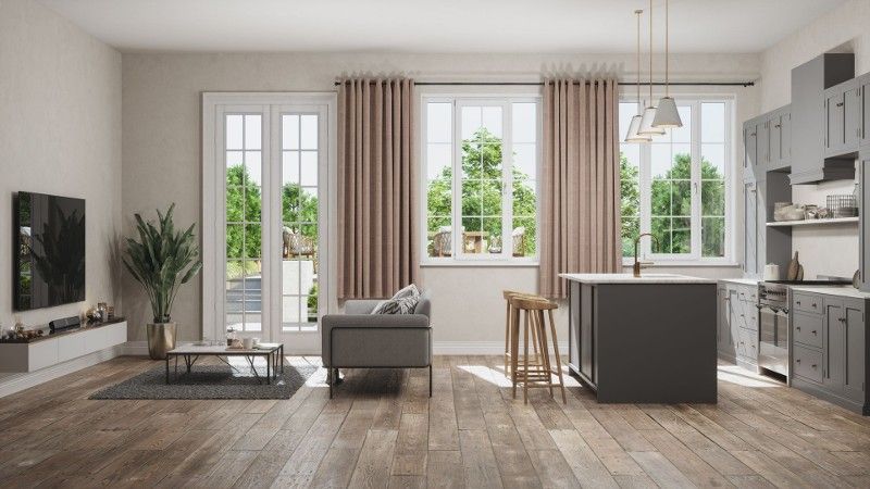 A living room and kitchen in a house.