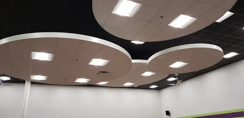 a room with a ceiling that has a lot of lights on it