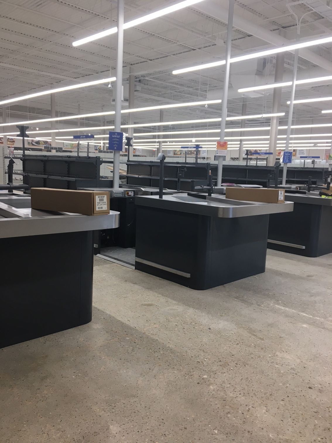 a row of cash registers in an empty store
