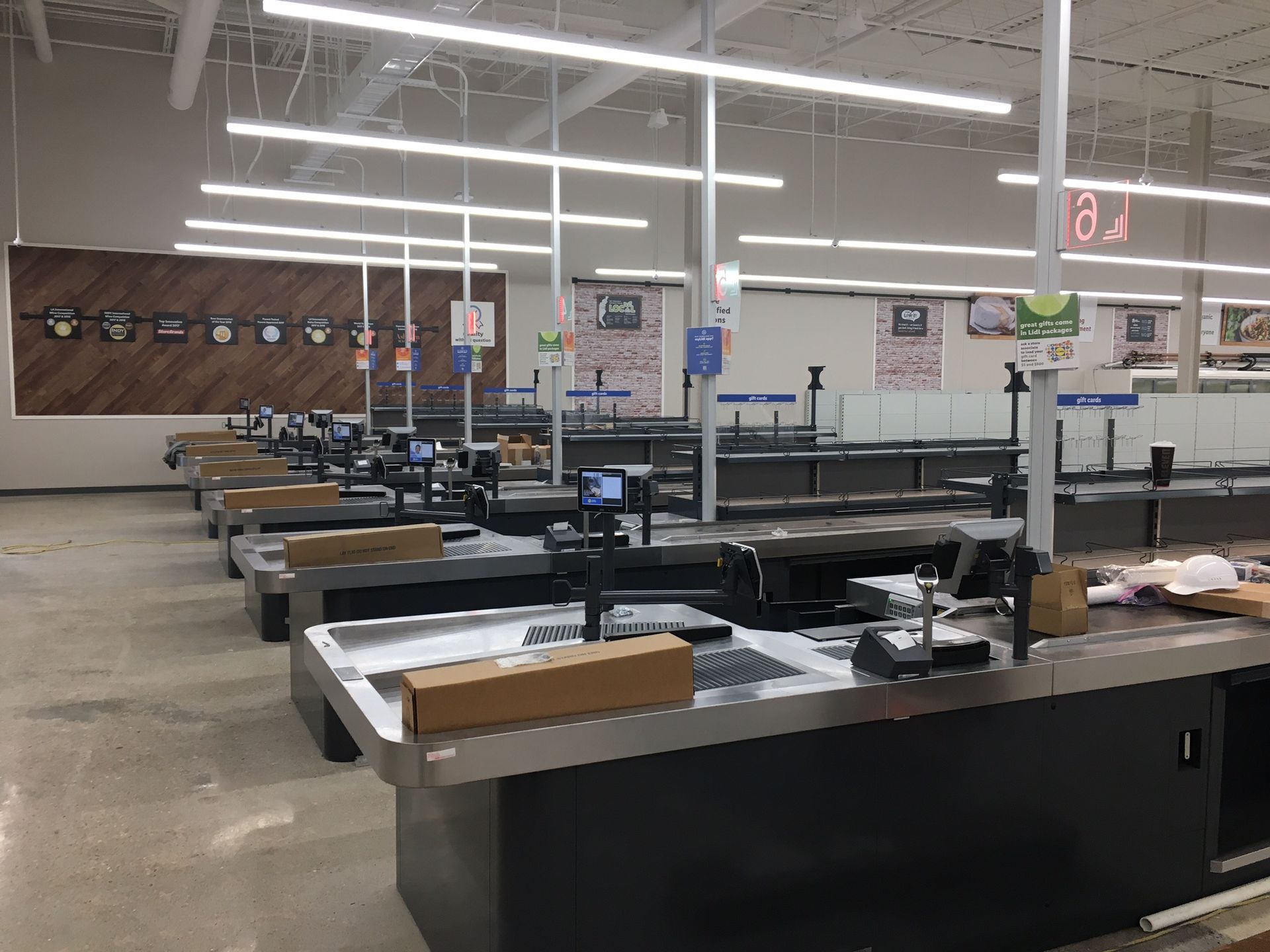 a row of cash registers in a grocery store