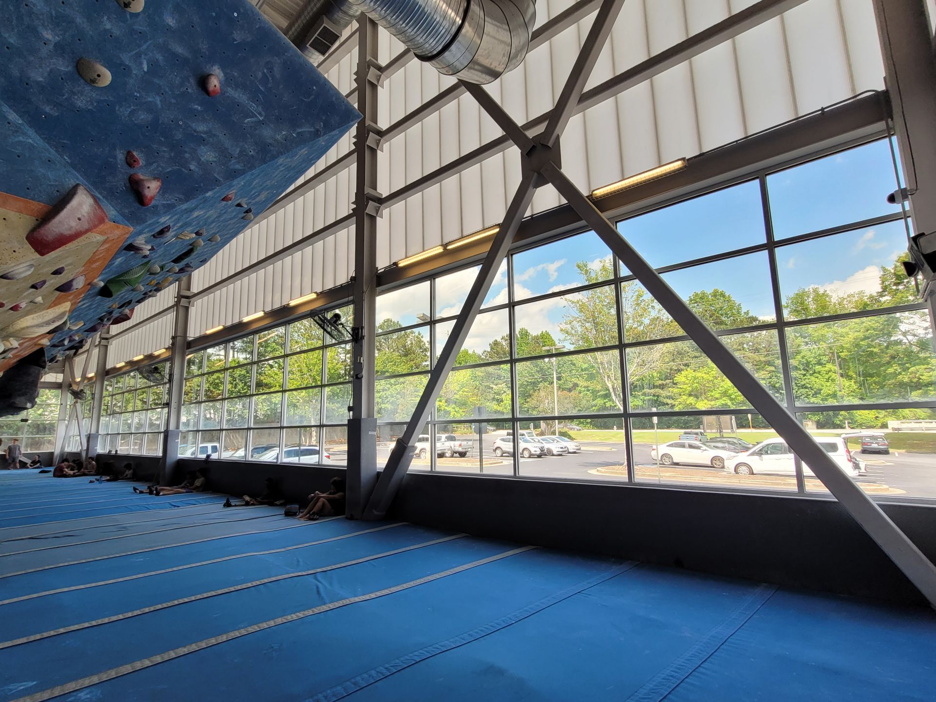 View through a large window, with a green 